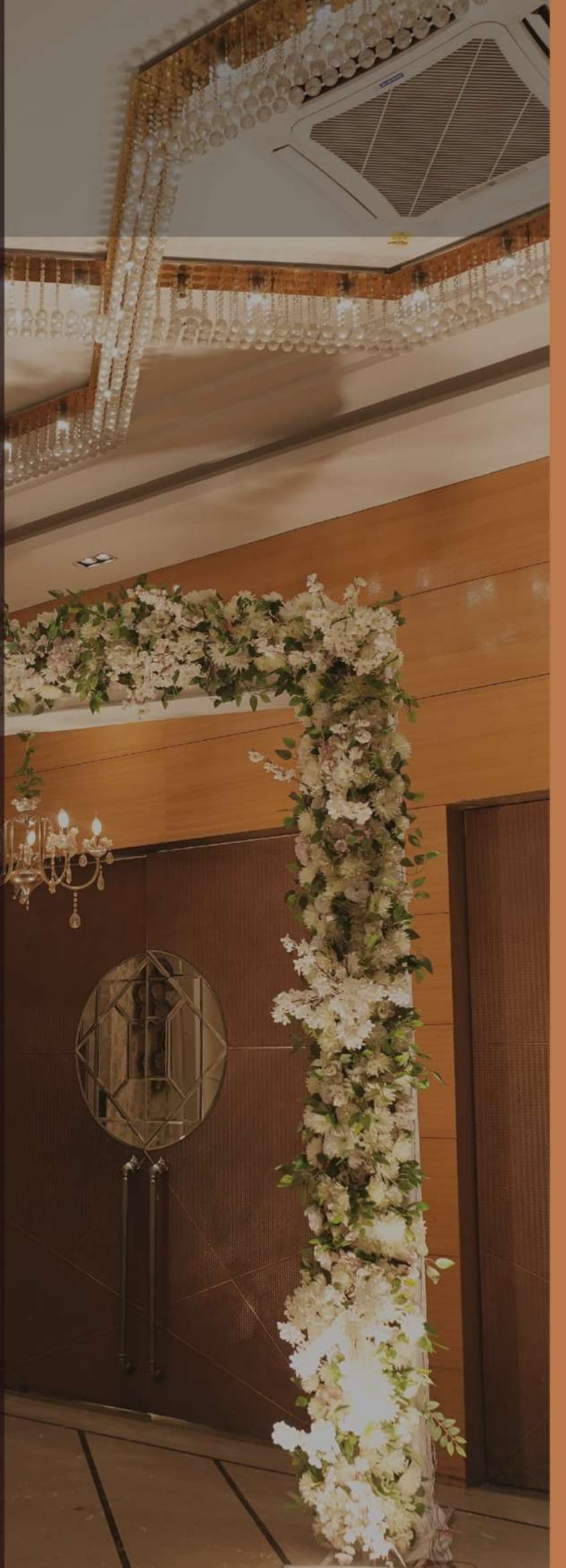 Nakshatra Hotel Grand Floral Banquet Archway and Chandeliers
