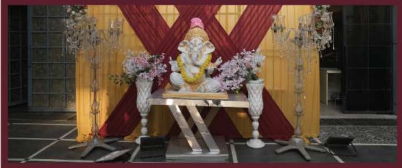 Traditional Indian Wedding Mandap with Floral Ganesha Backdrop